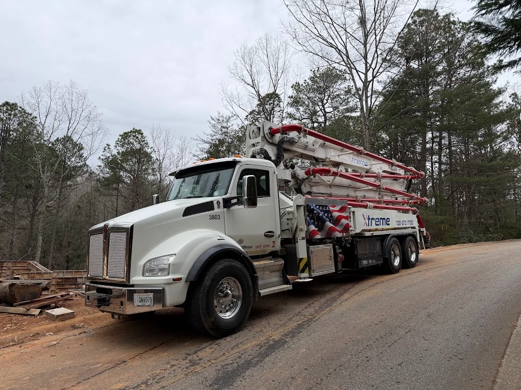 Xtreme Concrete Pumping team and truck ready for a job in Jefferson, Georgia.